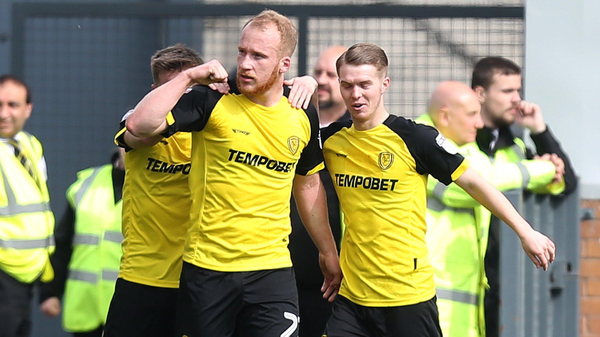 Liam Boyce celebrate's scoring Burton's opener