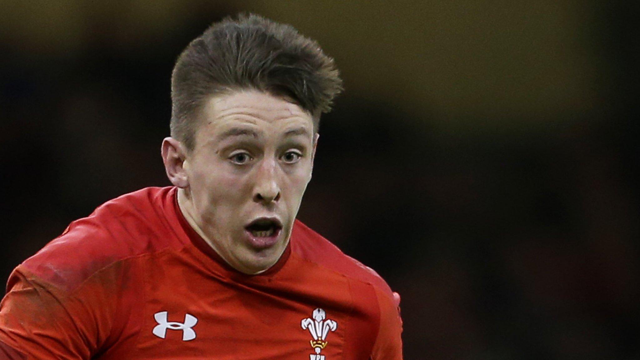 Josh Adams on the attack for Wales