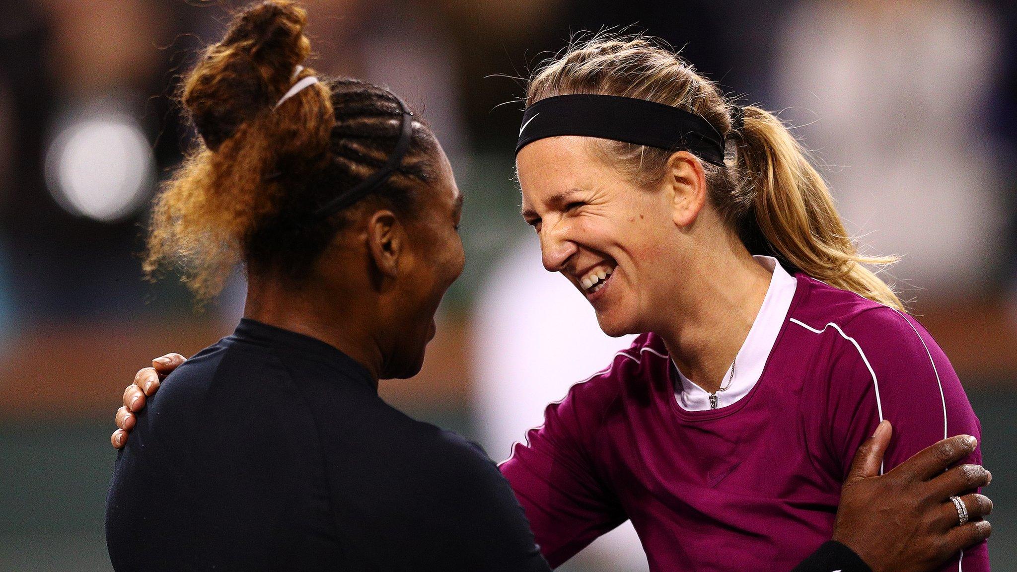 Serena Williams of the United States shares a moment with Victoria Azarenka of Belarus after their women's singles second round match on Day 5 of the BNP Paribas Open
