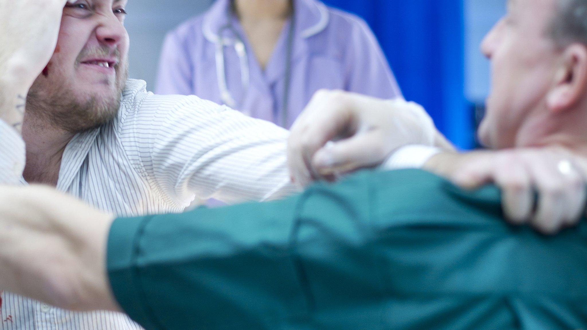 a man attacking a hospital worker