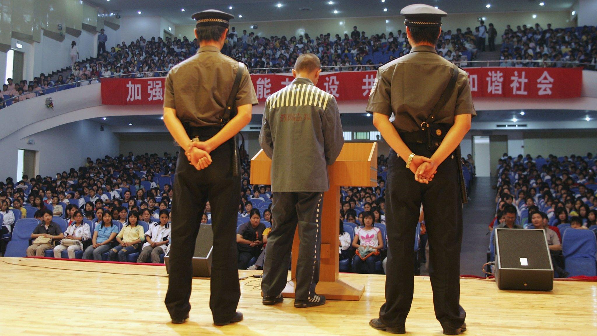 A young offender giving a speech at a school in China in May 2017