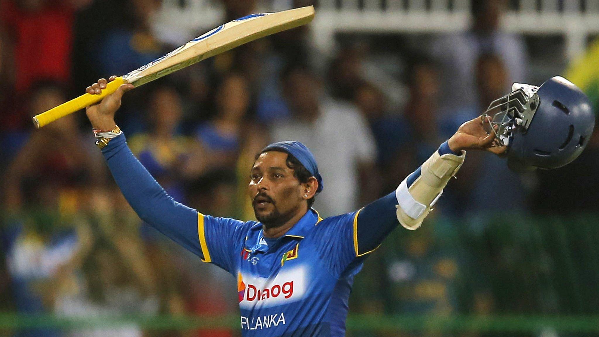 Tillakaratne Dilshan walks off after his farewell international innings