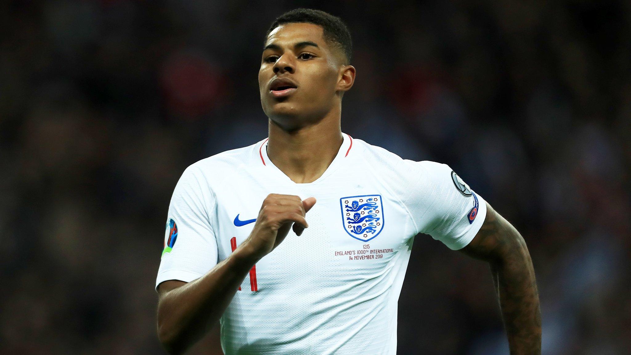 Marcus Rashford celebrates scoring a goal for England