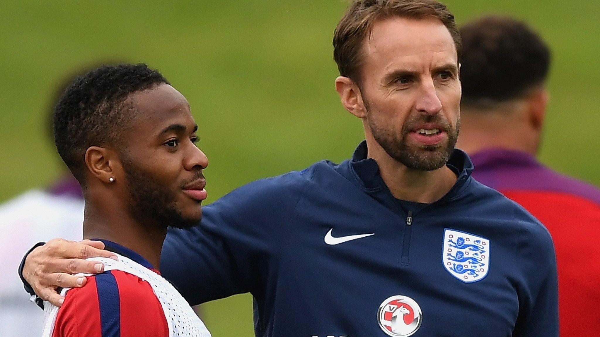 England player Raheem Sterling and manager Gareth Southgate