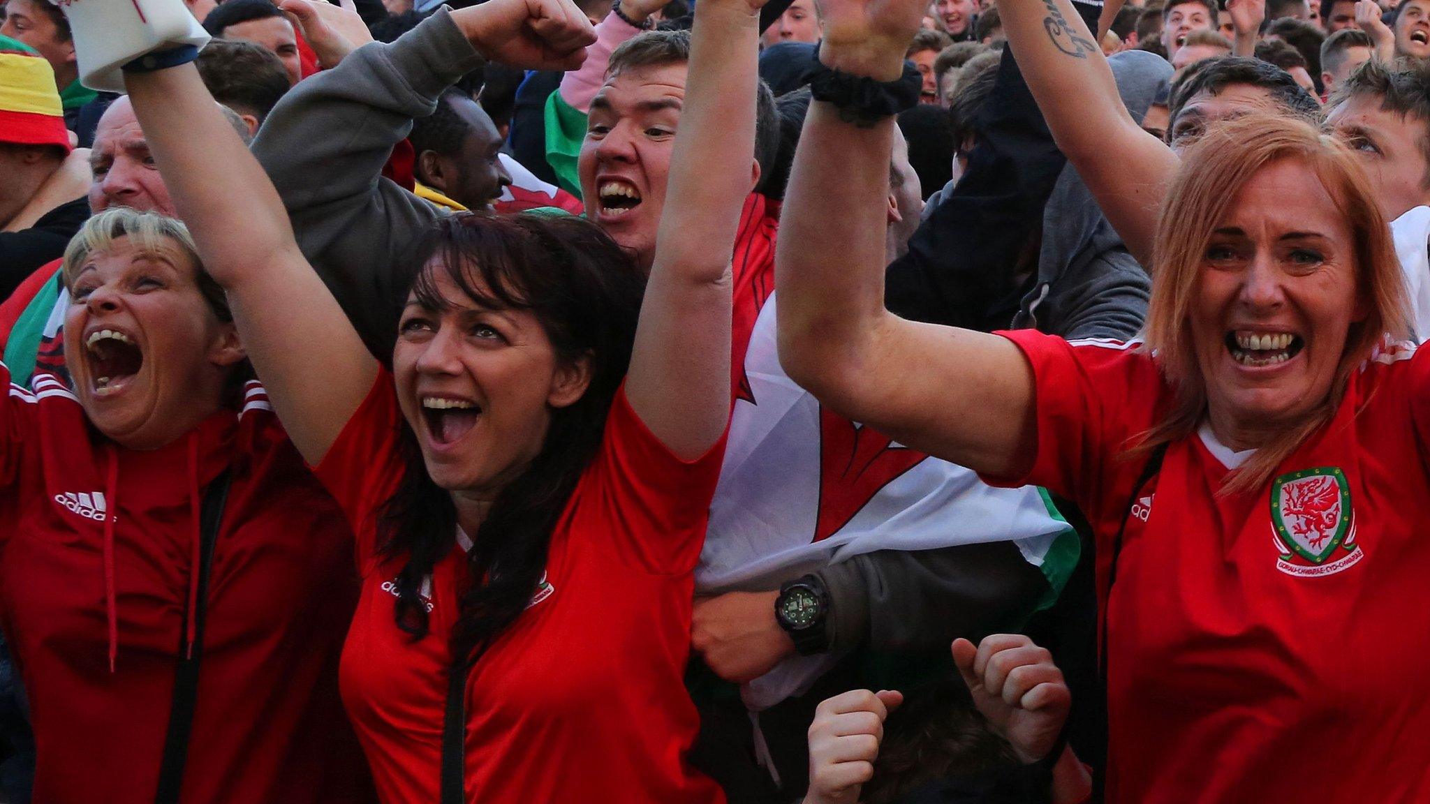 Wales fans celebrate as their team beat Belgium