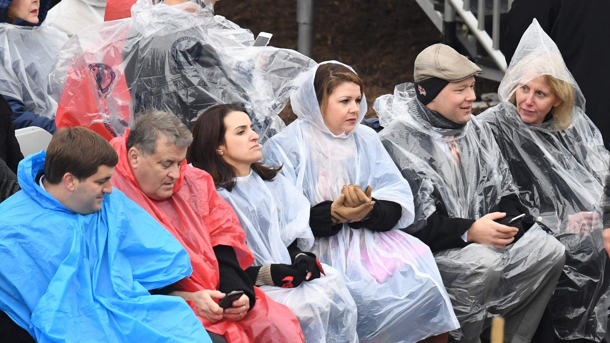 People gather to watch inauguration