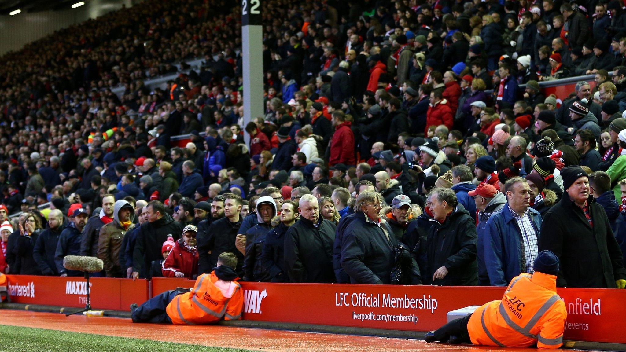 Liverpool fans take part in walkout protest