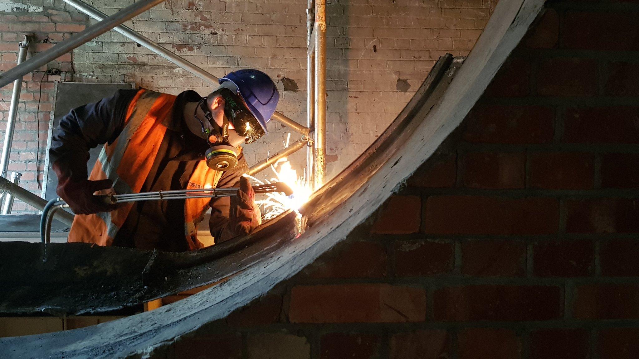 Worker welding at Colston Hall