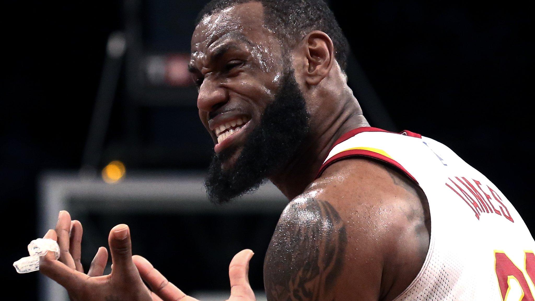 Cleveland Cavaliers forward LeBron James gestures after foul call against him