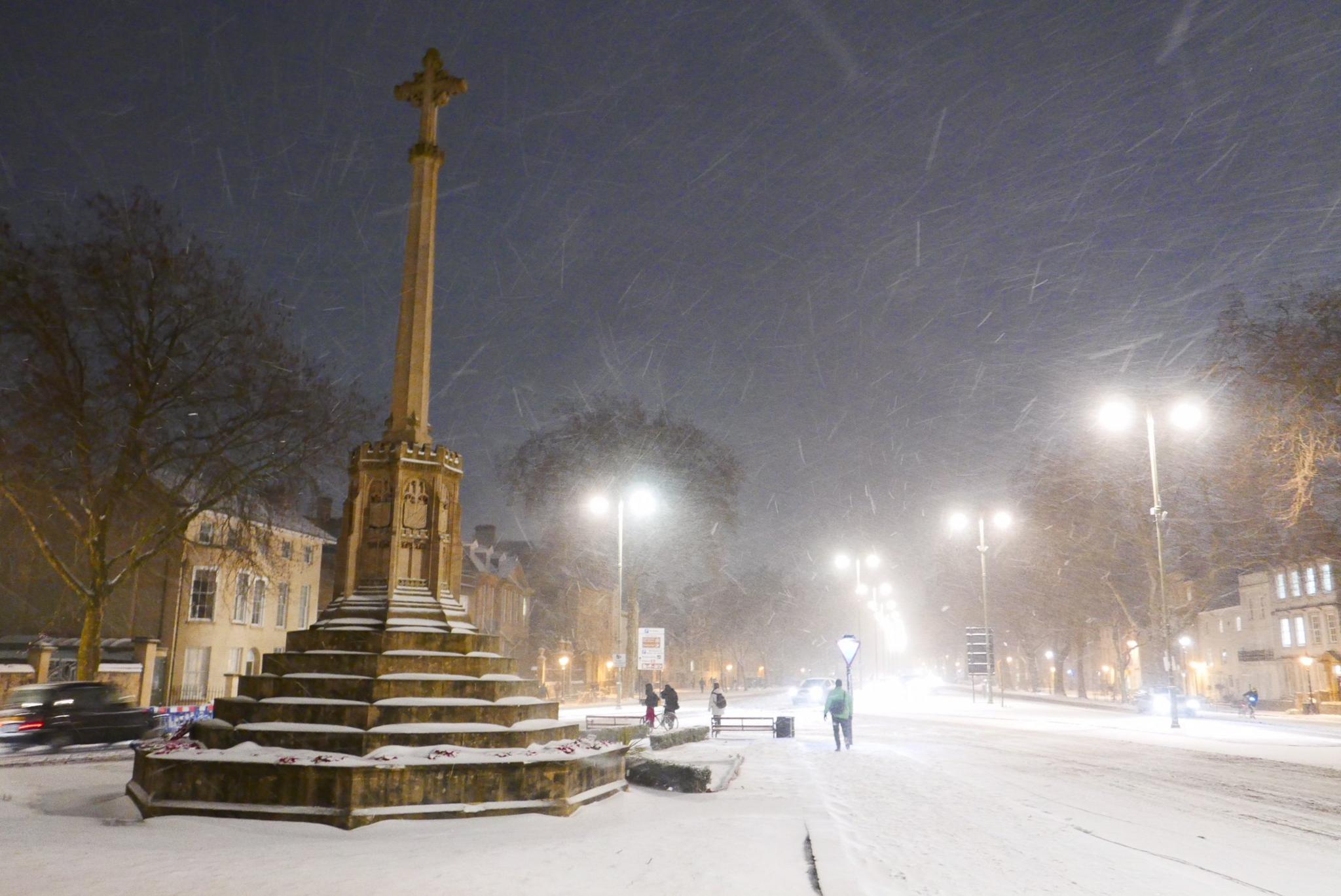 Snow falling on St Giles in Oxford city centre