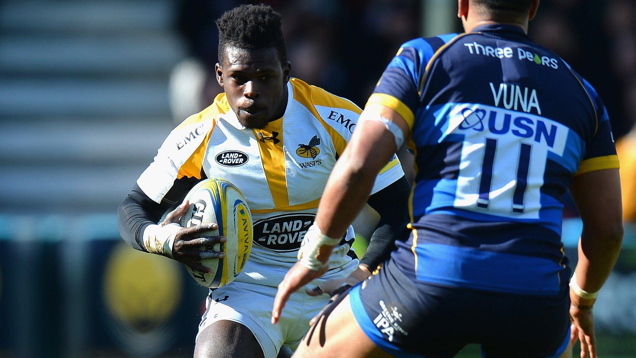 Christian Wade looks for a way past Cooper Vuna in Saturday's 54-35 win at Sixways