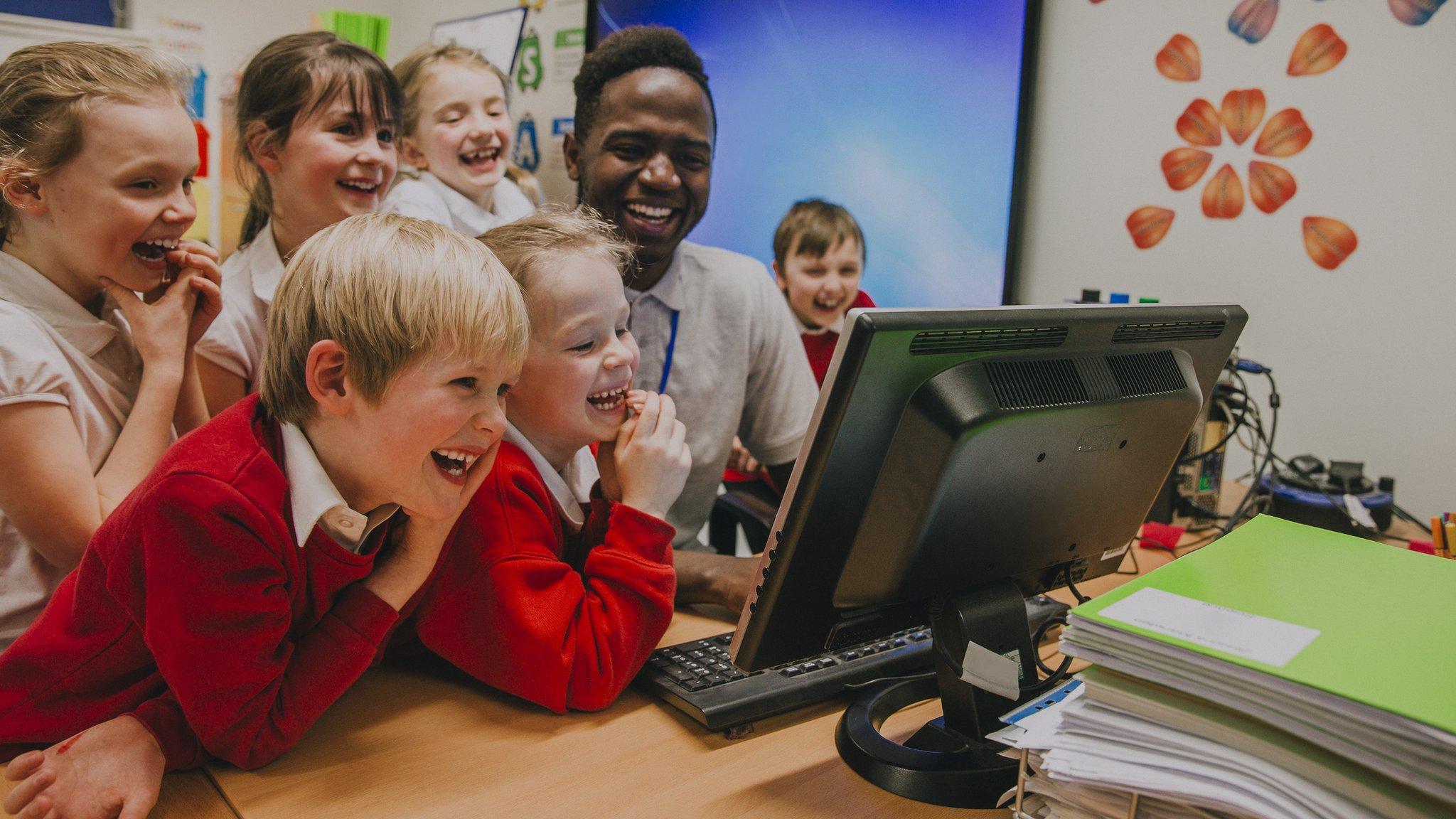 Teacher and school children