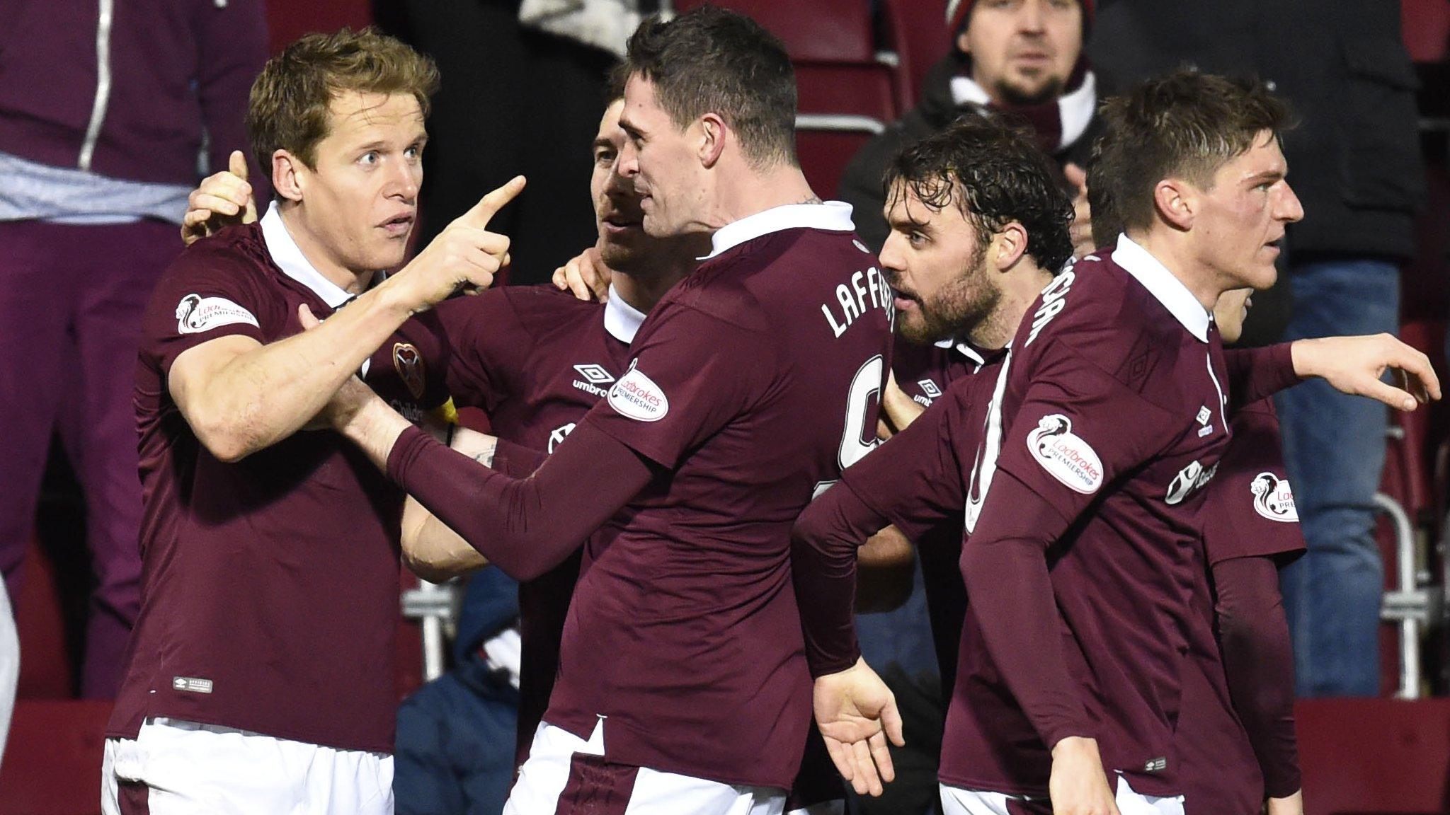 Hearts captain Christophe Berra celebrates