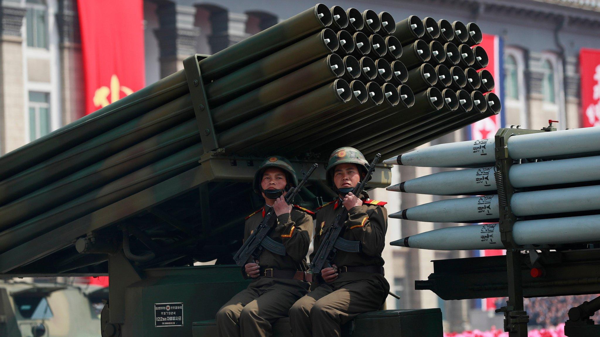 North Korean soldiers are seen on military armour vehicles during a parade for the "Day of the Sun" festival on Kim Il Sung Square in Pyongyang, North Korea