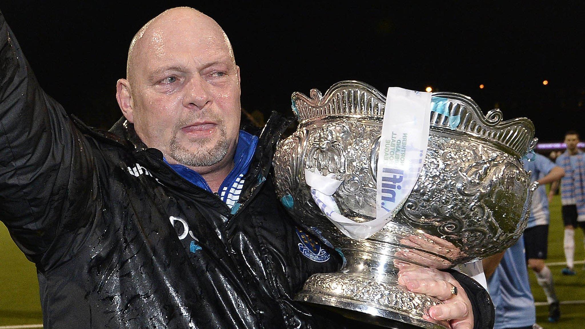 Ballymena manager David Jeffrey celebrates with the League Cup