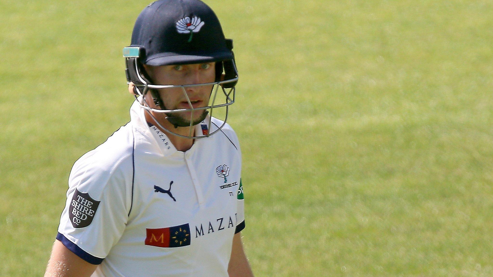 England captain Joe Root walks off after being bowled out for a golden duck against Essex