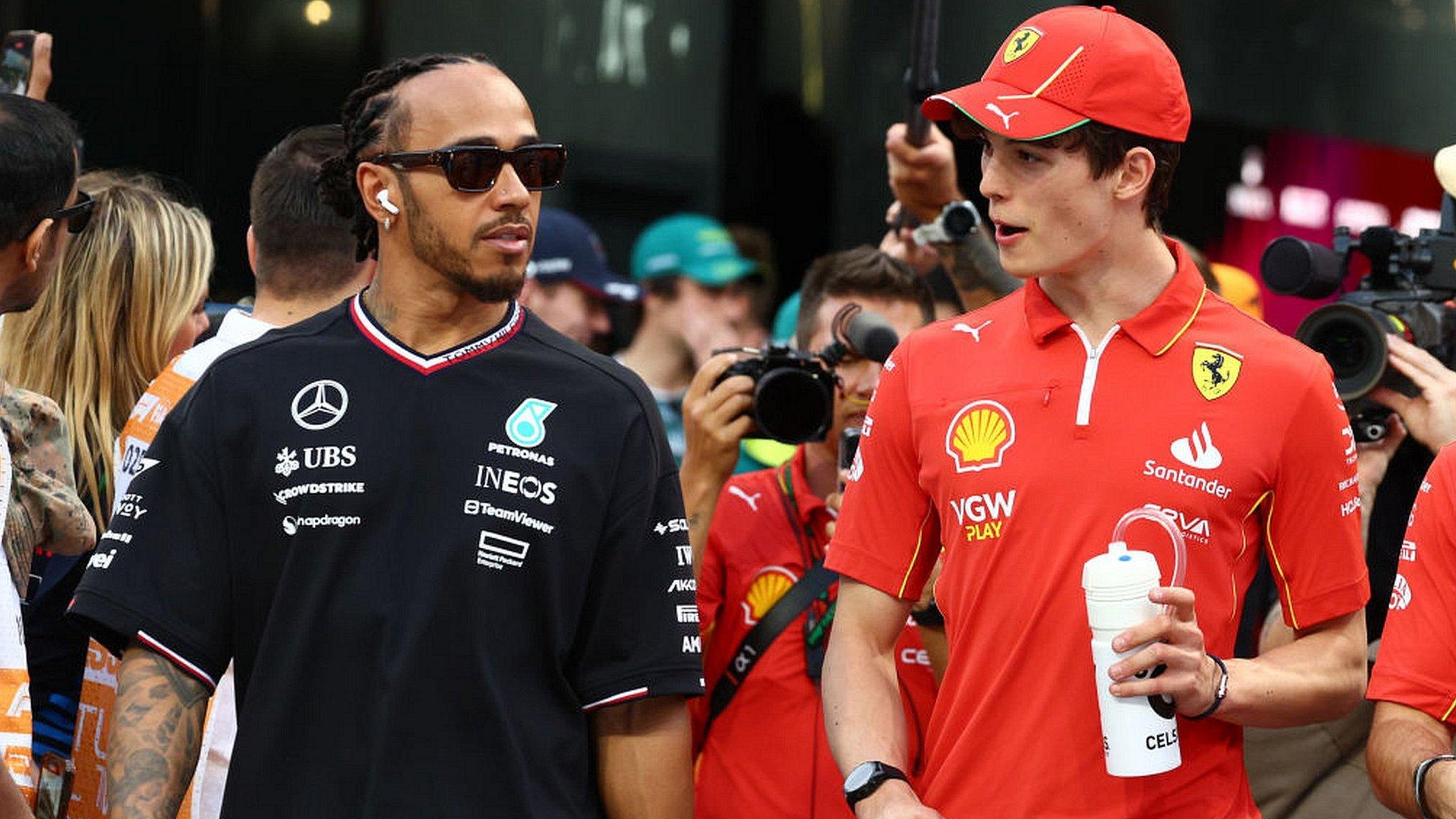 Lewis Hamilton (left) with Oliver Bearman