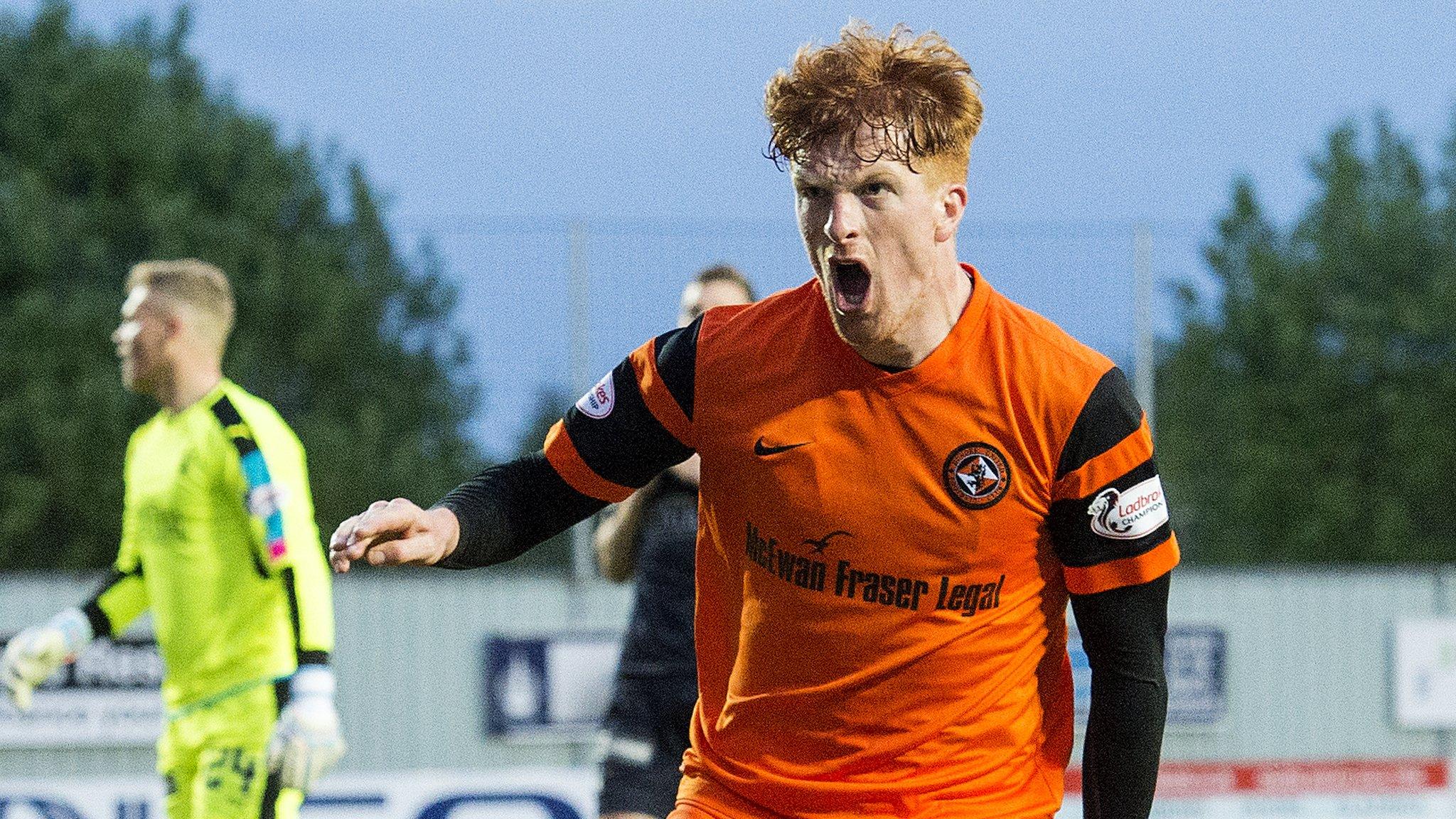 Simon Murray celebrates his goal