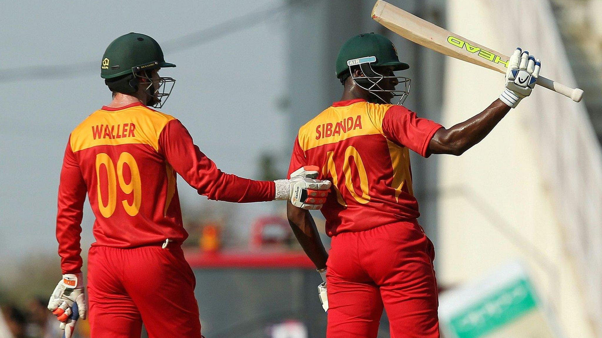 Zimbabwe's Vusi Sibanda celebrates his fifty