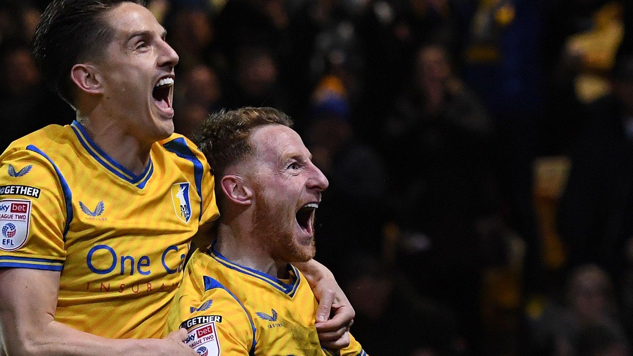 Stephen Quinn celebrates his goal for Mansfield Town against Accrington