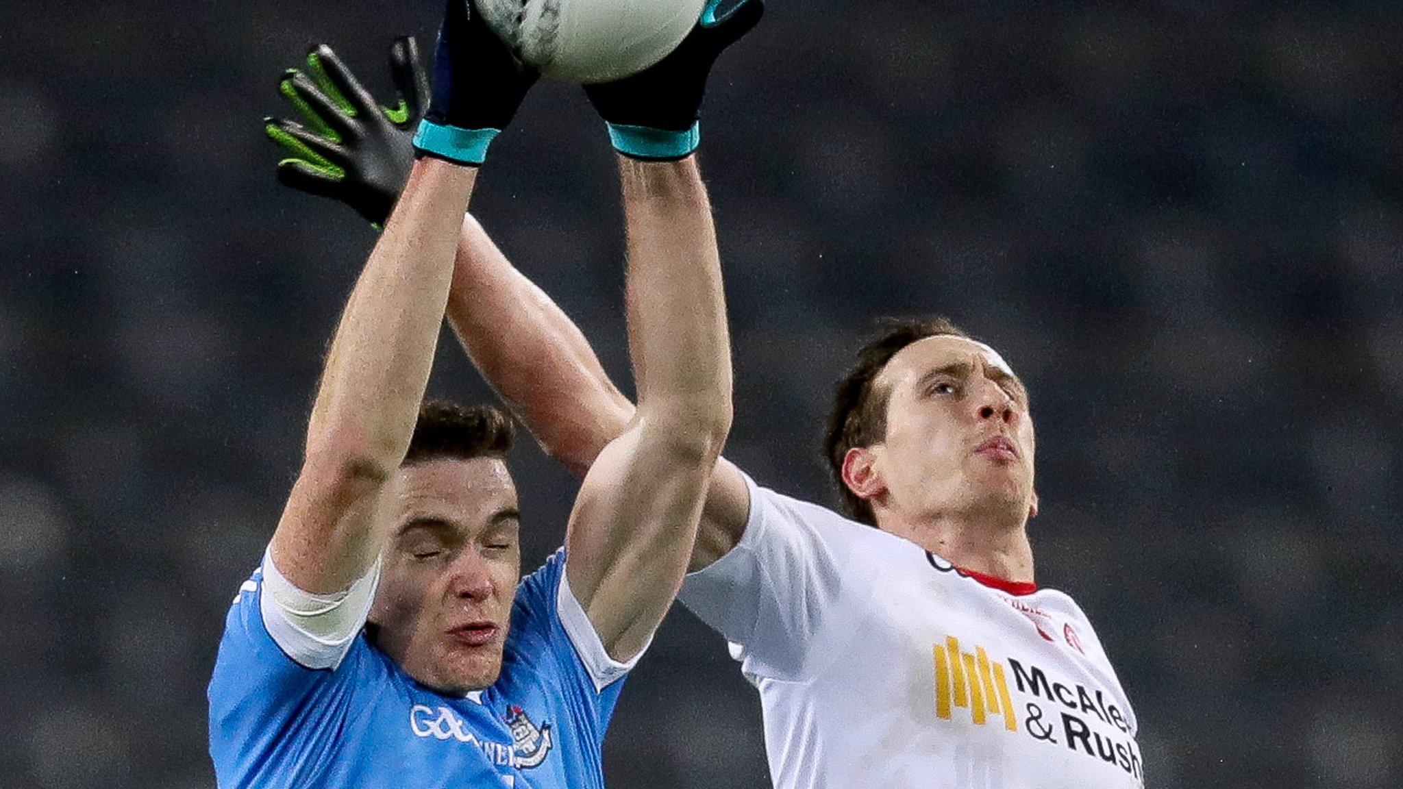 Dublin's Brian Fenton beats Tyrone midfielder Colm Cavanagh to the high ball