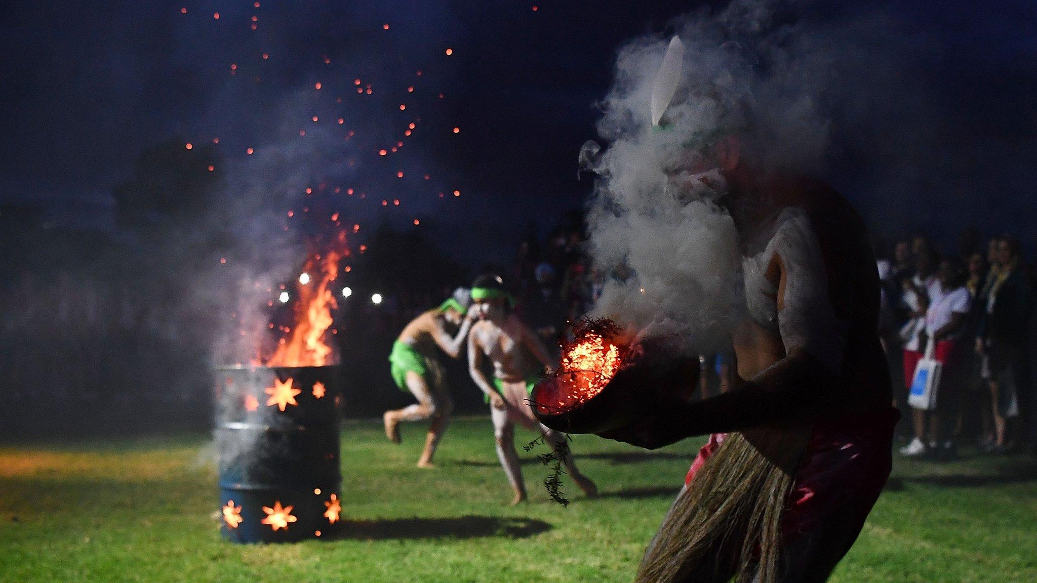 Traditional Aboriginal dancers are seen performing a 'Welcome to Country' ceremony with athletes at Jezzine Barracks during an official welcome ceremony ahead of the 2018 Commonwealth Games on April 4, 2018 in Townsville, Australia.