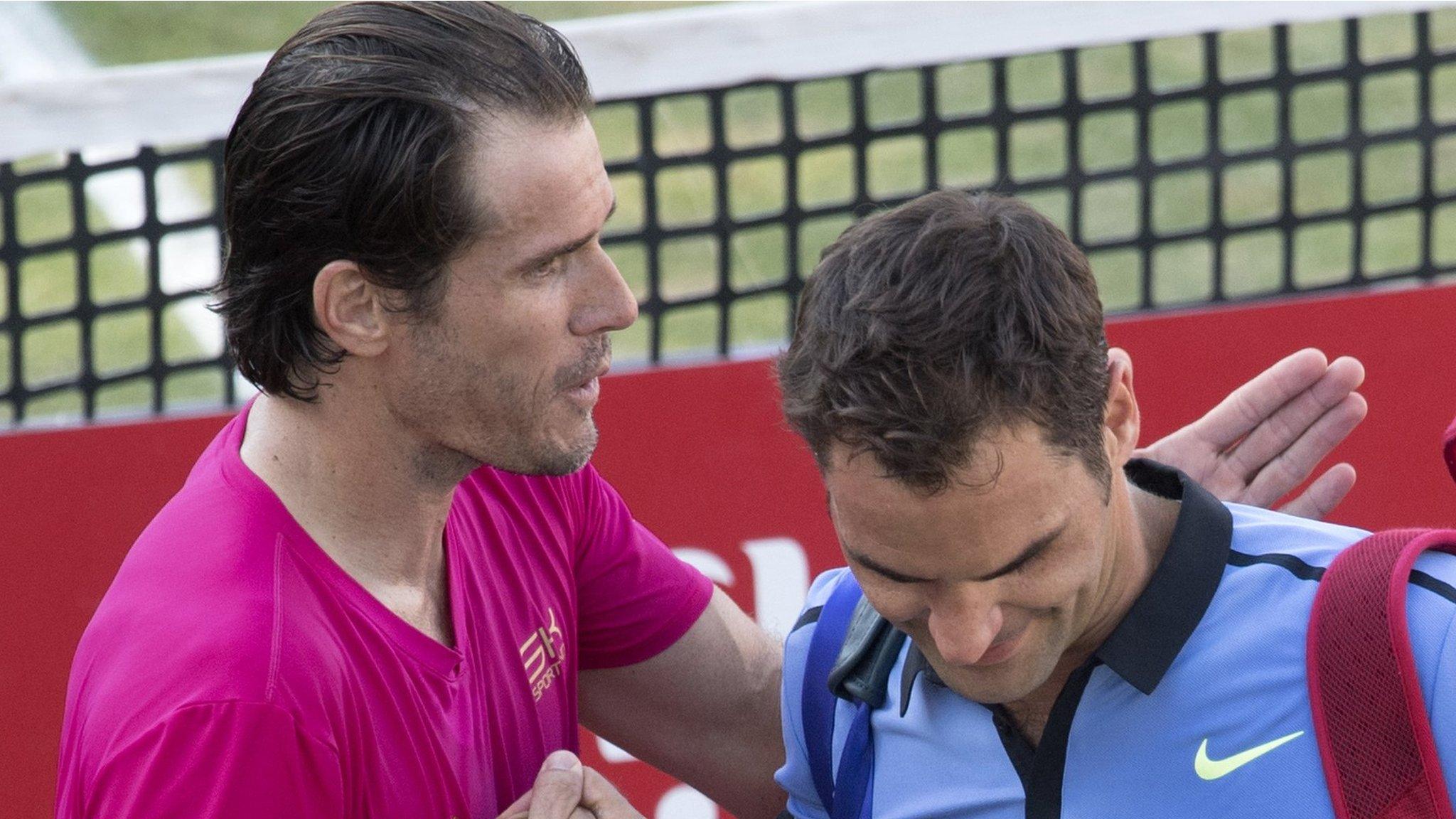 Tommy Haas (left) and Roger Federer