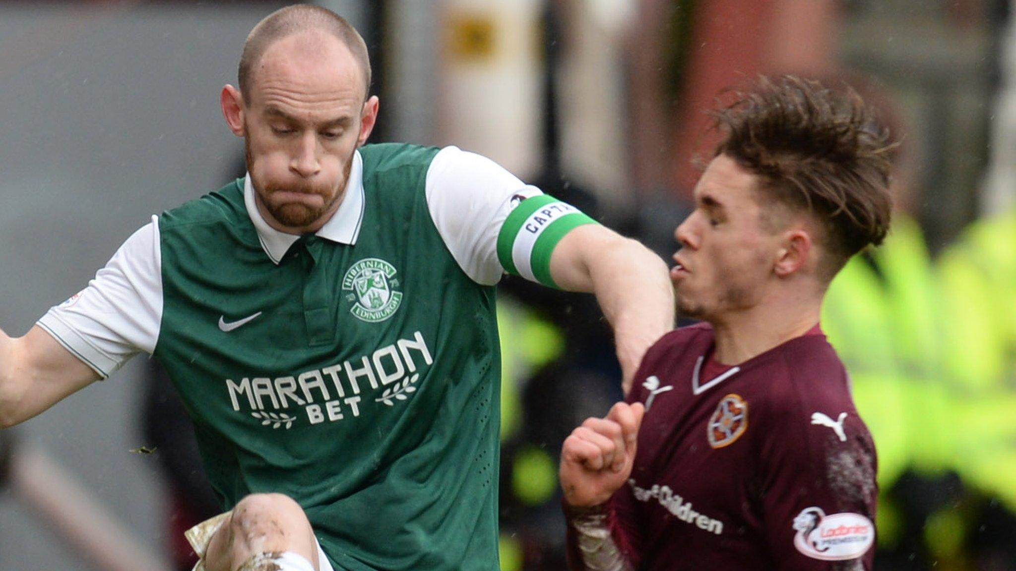 Hibernian's David Gray in action against Hearts' Sam Nicholson