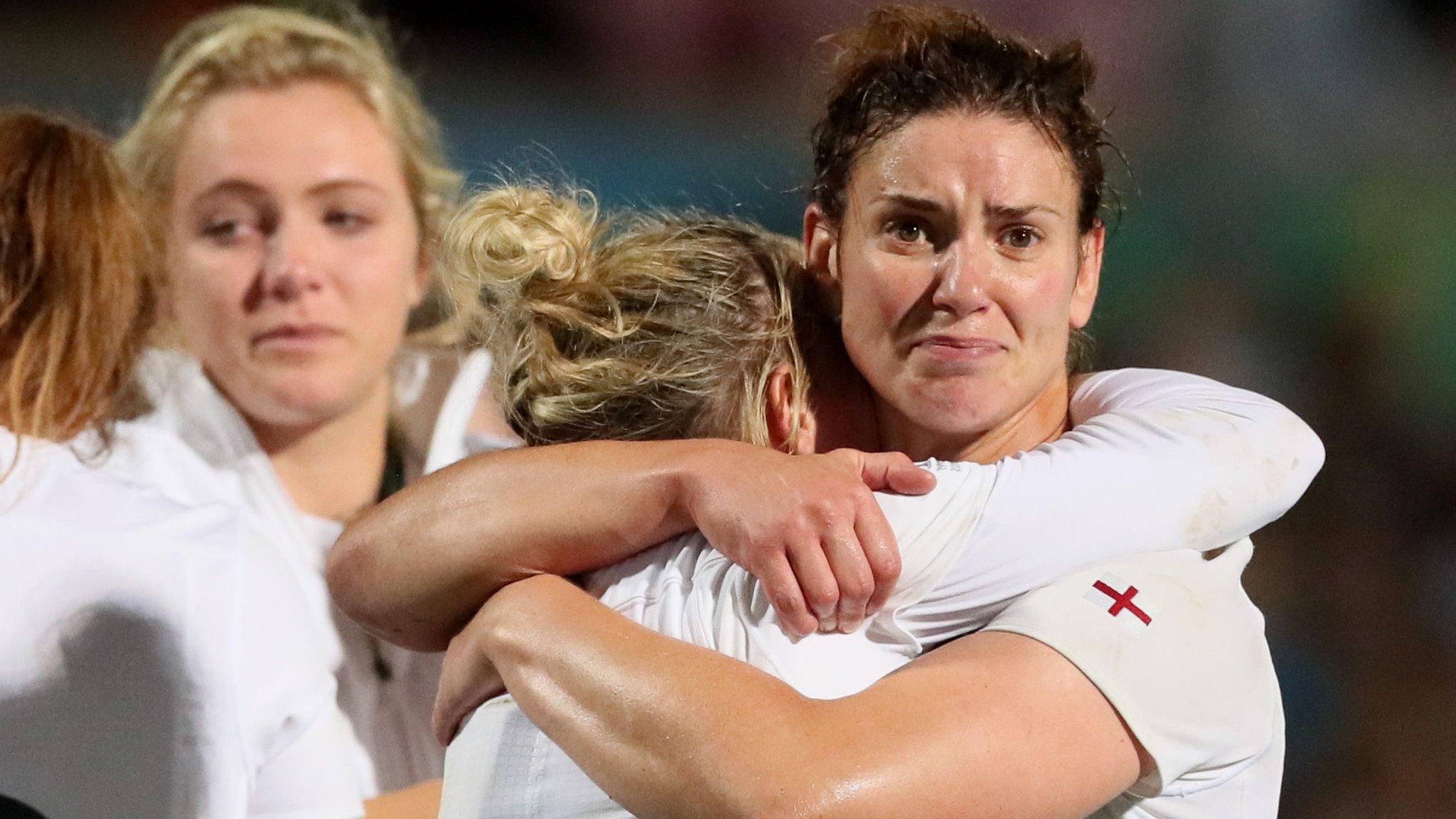 England captain Sarah Hunter embraces a team-mate after defeat by New Zealand in the World Cup final