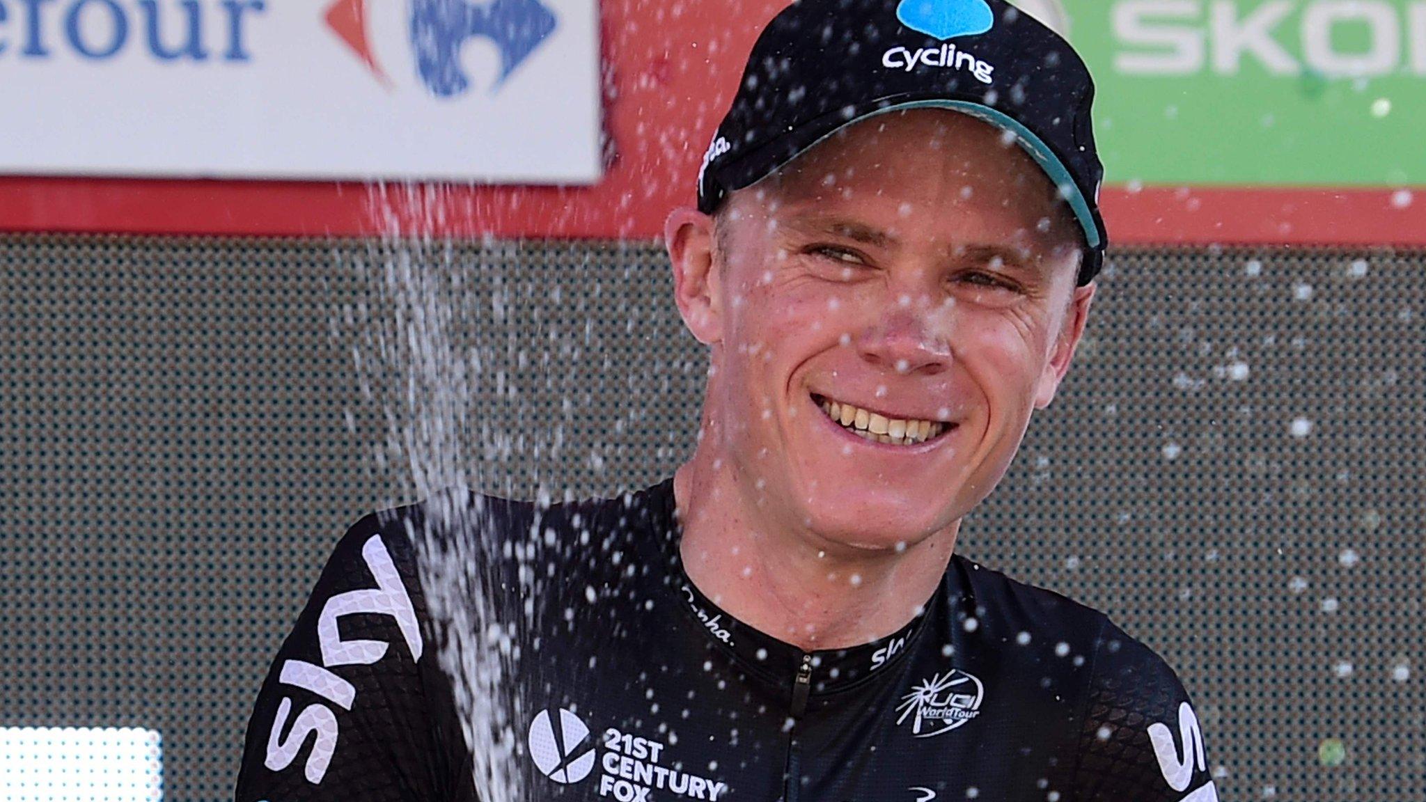 Chris Froome celebrates winning stage 19