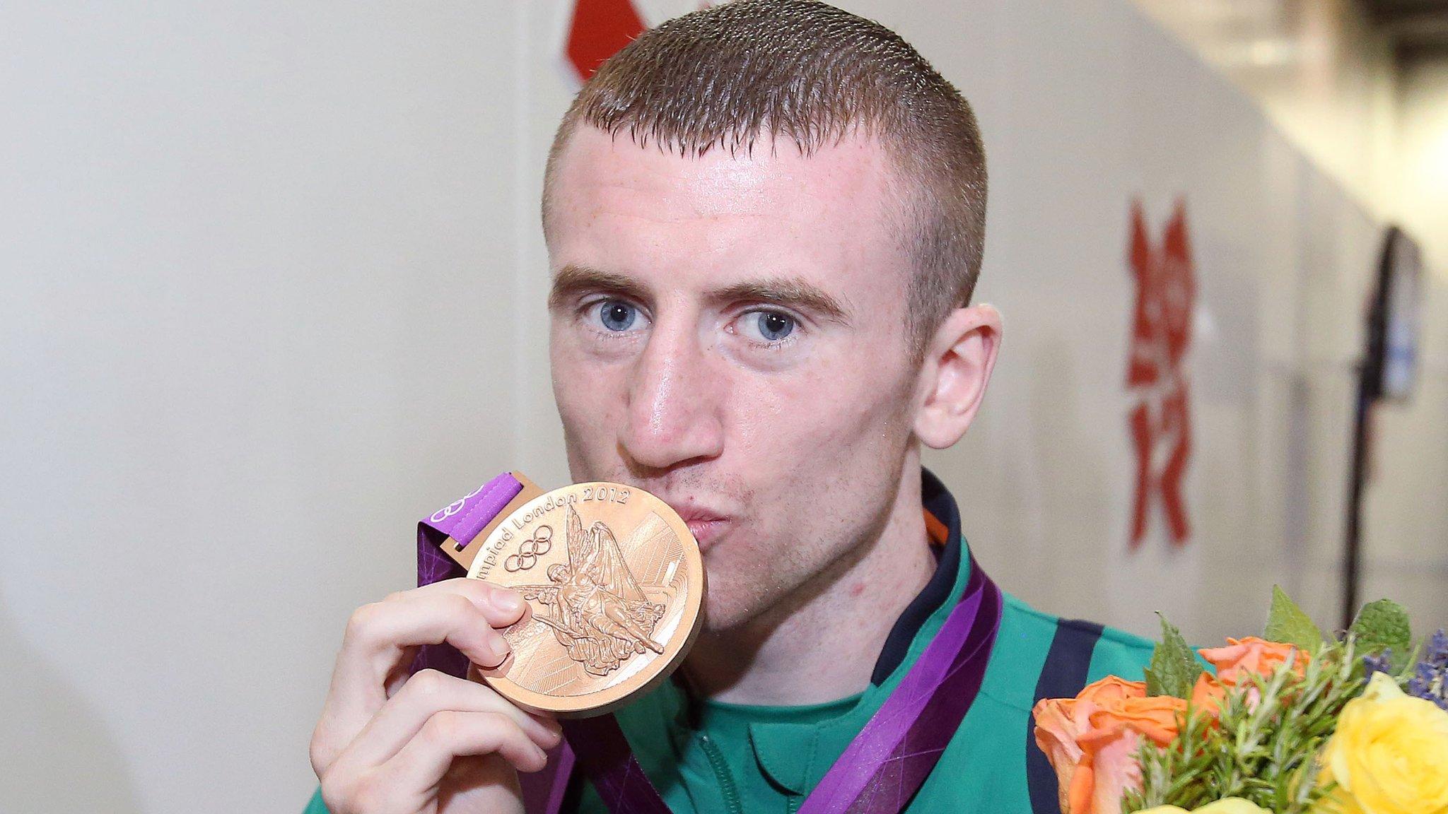 Paddy Barnes celebrates winning a bronze medal at the London Games in 2012