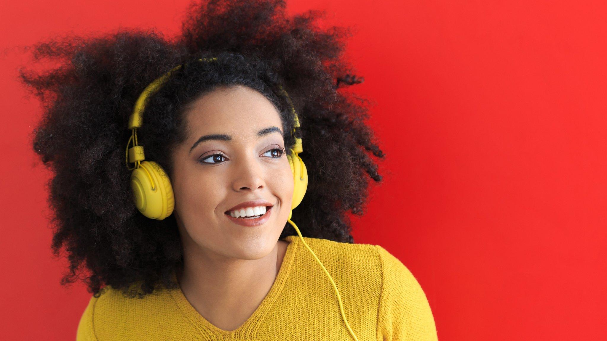 A woman listening to music