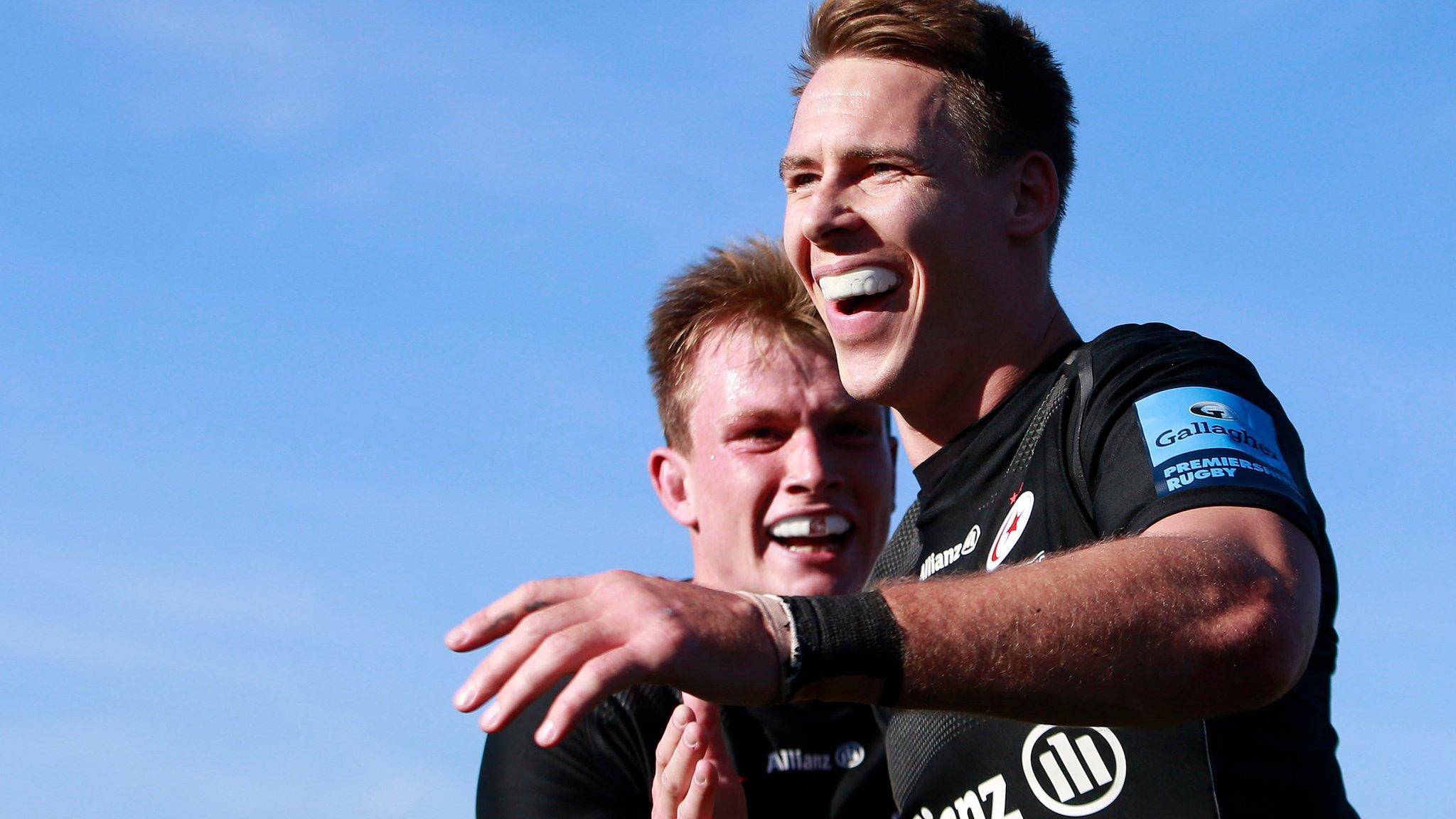 Liam Williams (right) celebrates his third try against Bath with Nick Tompkins