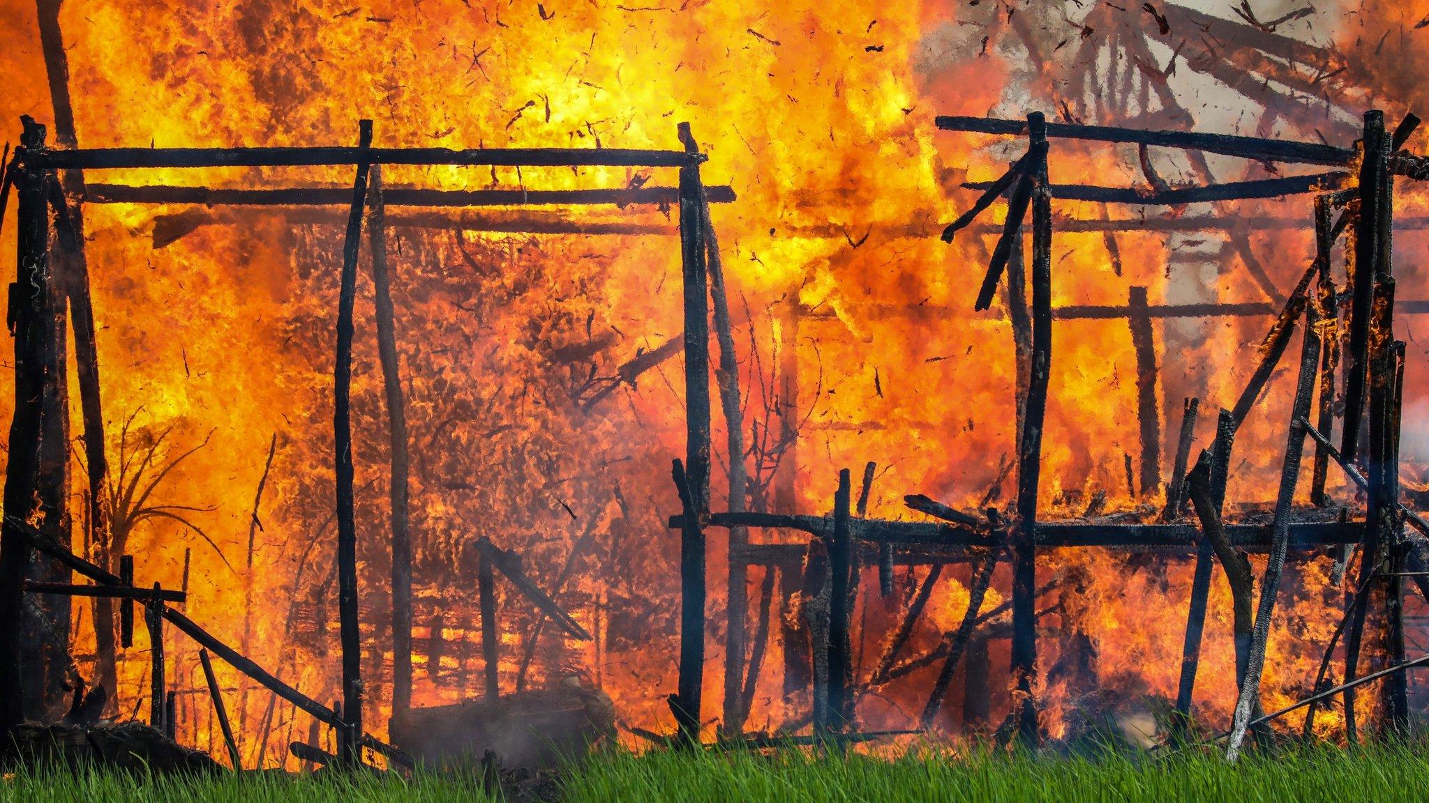 Fire engulfs a village in Rakhine on 7 September 2017