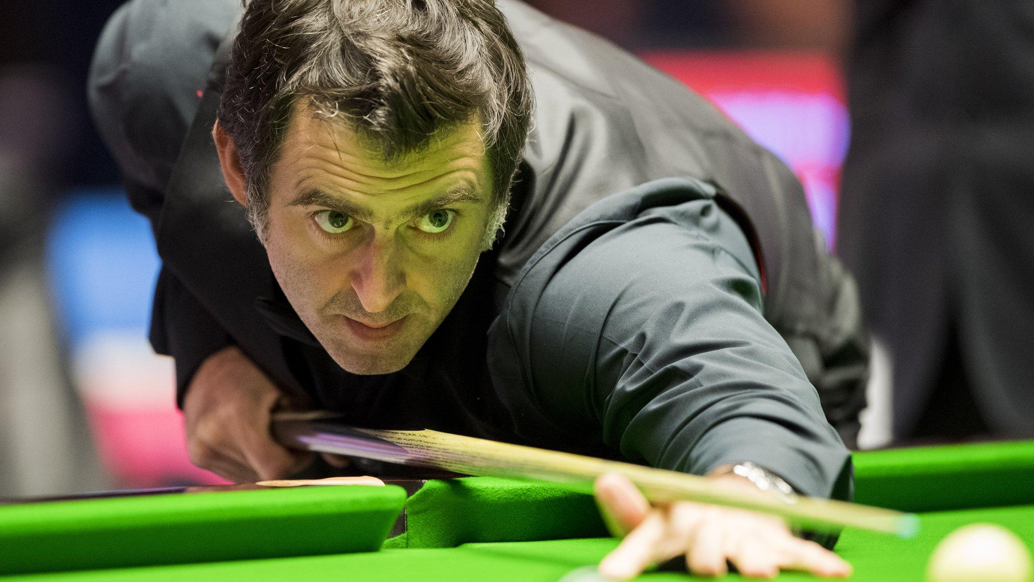 Ronnie O'Sullivan plays a shot against Robert Milkin