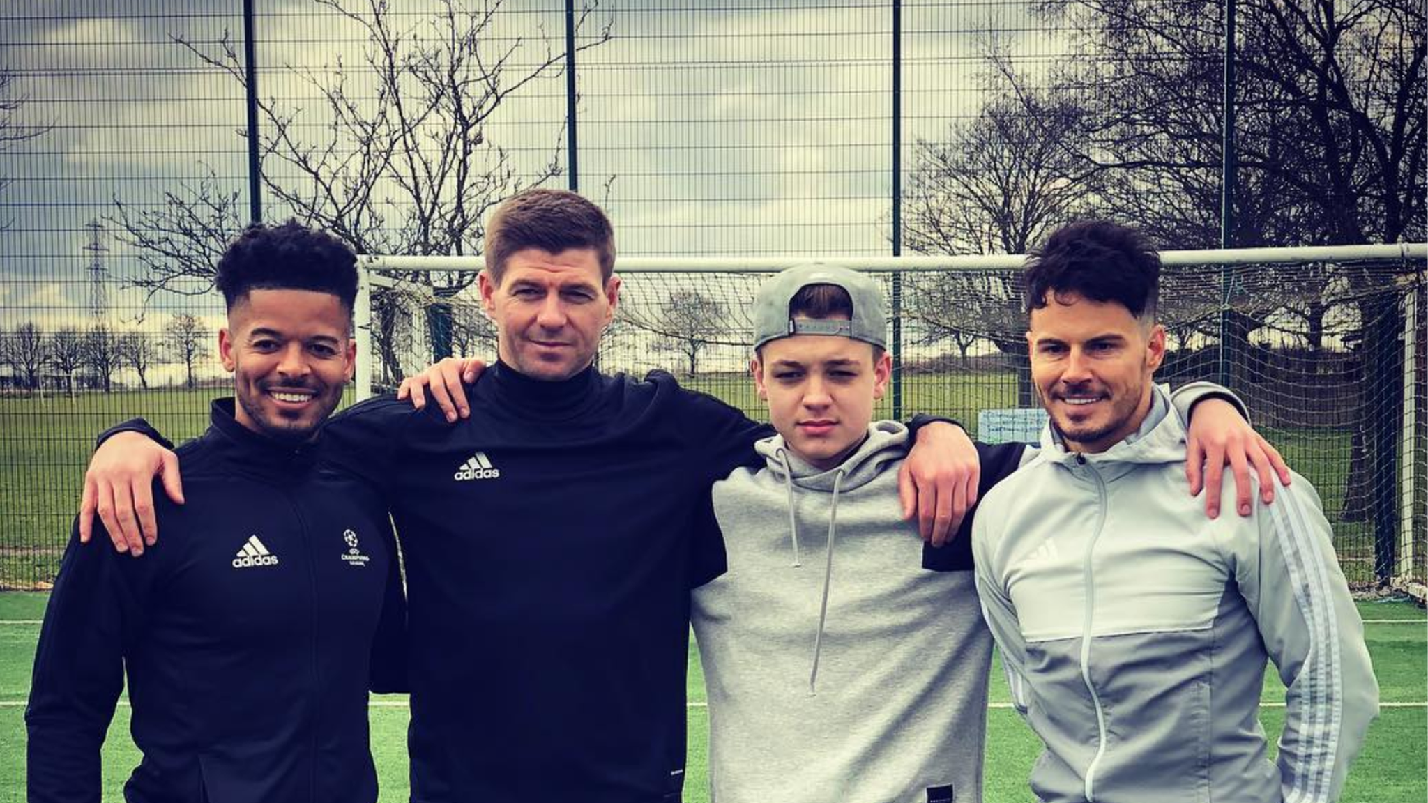 Donovan Hunt, Steven Gerrard, Billy Wingrove and Jeremy Lynch at Liverpool's Melwood training ground.