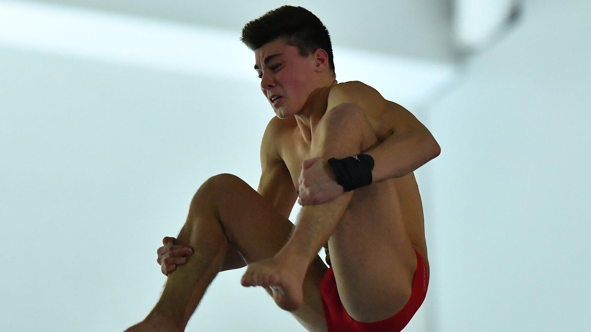 Matthew Dixon dives for the British title