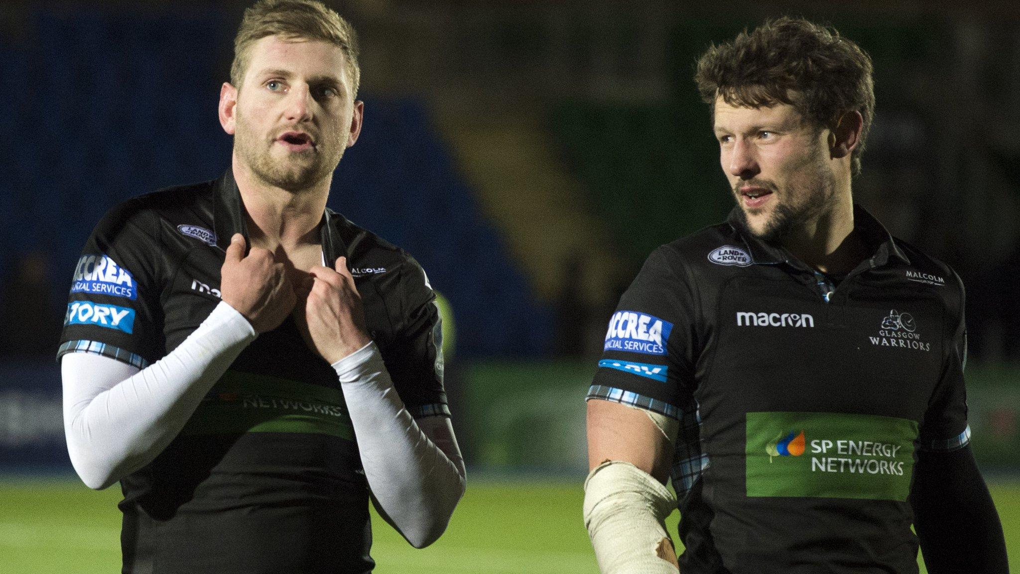 Finn Russell and Peter Horne cut dejected figures after Glasgow Warriors' European loss to Montpellier