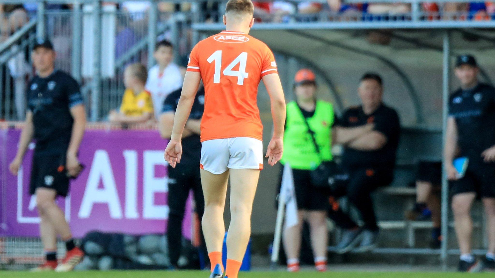 Rian O'Neill heads to the Armagh dug out after being sent off against Tyrone