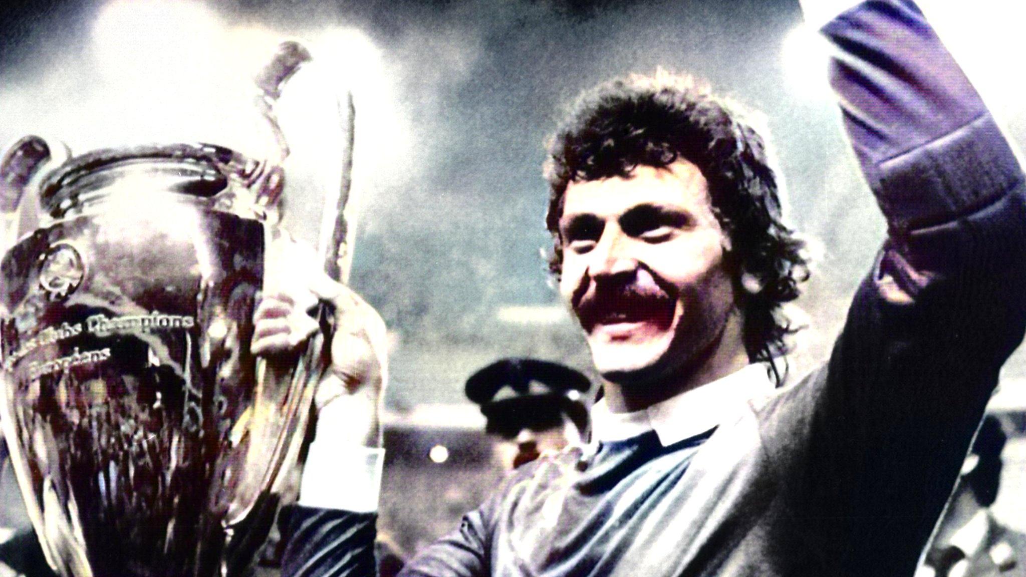 Steaua keeper Helmut Duckadam celebrates with the European Cup trophy in 1986