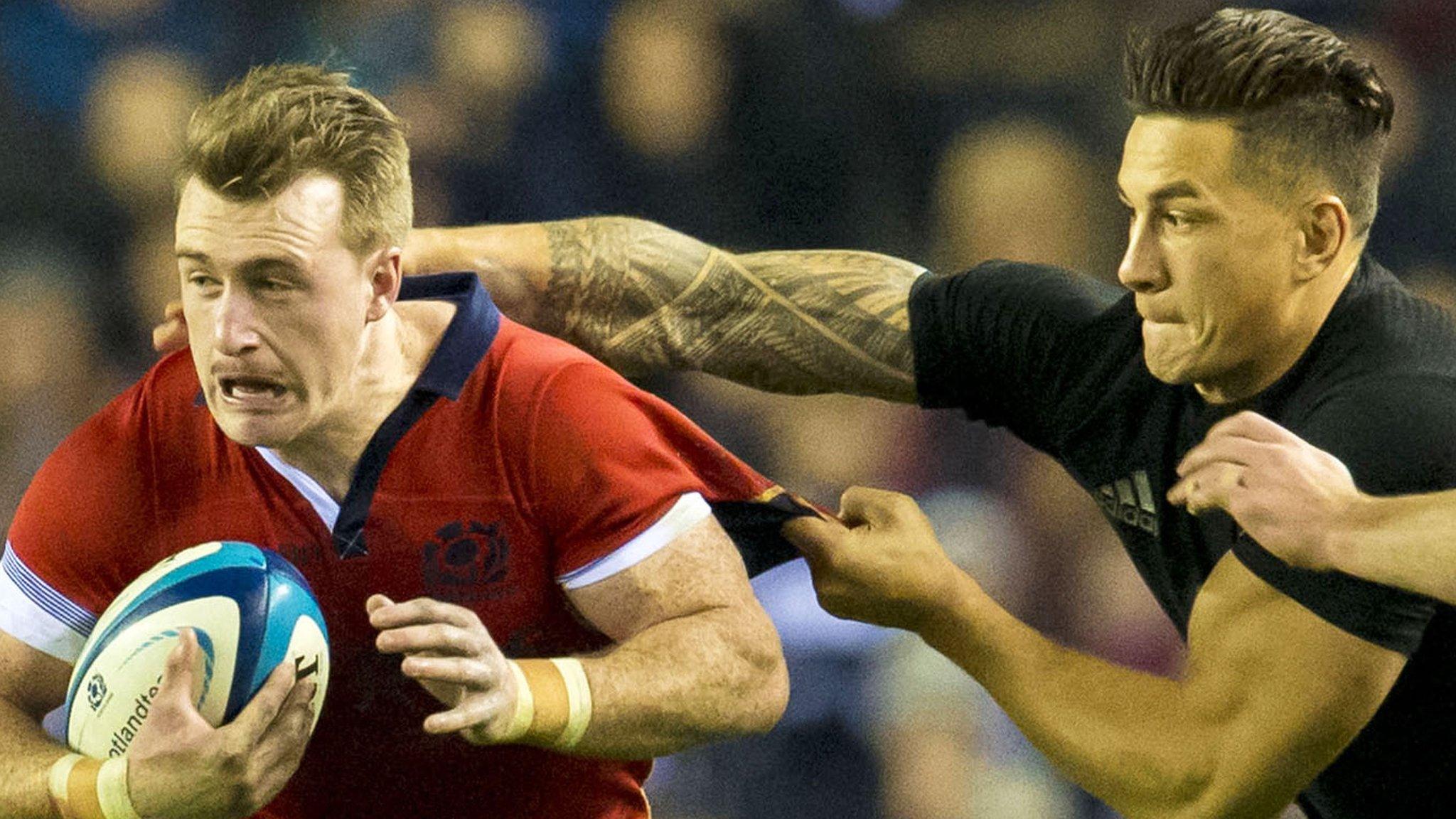 Scotland's Stuart Hogg (left) in action against New Zealand