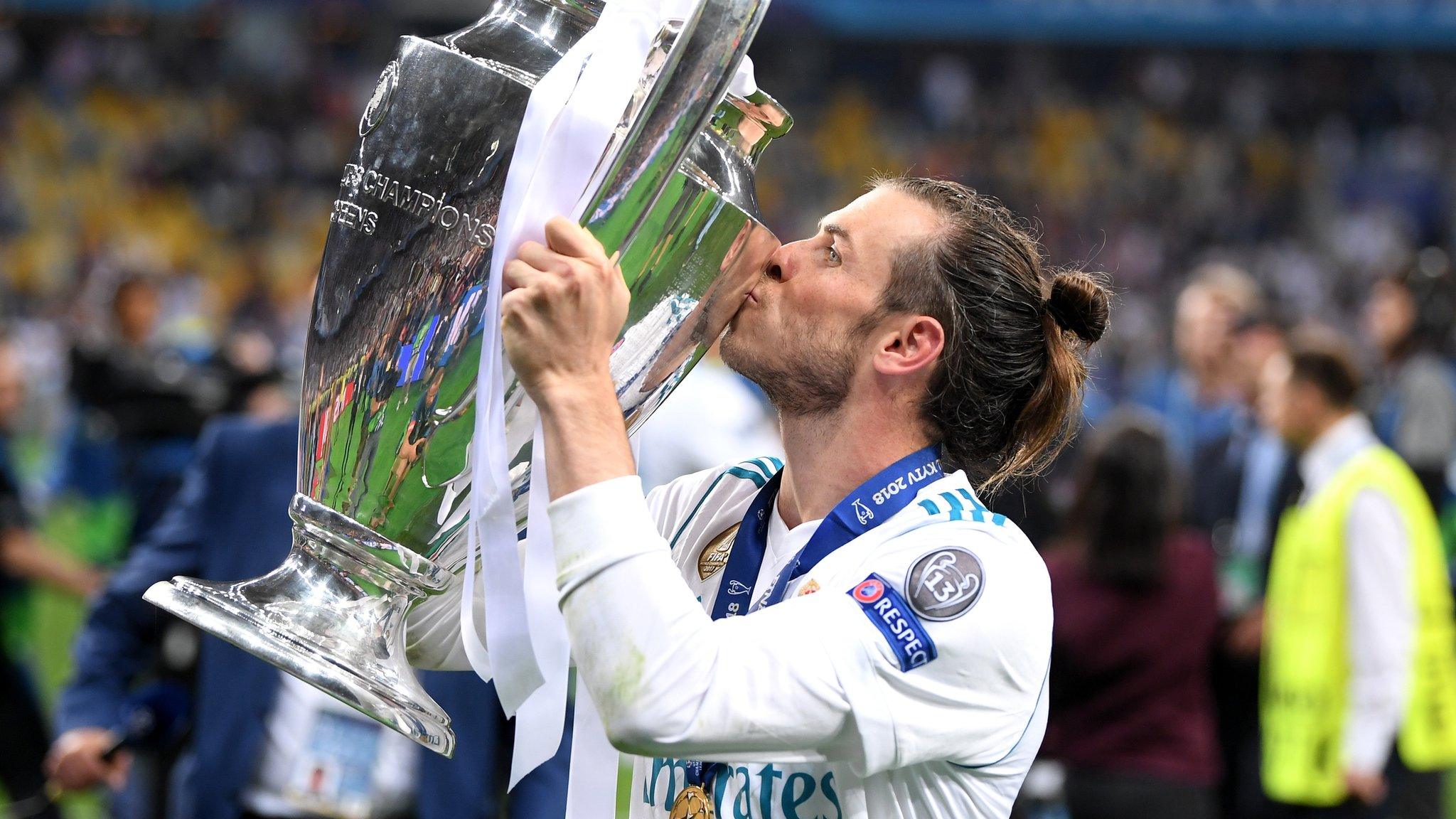 Gareth Bale kisses the Champions League trophy