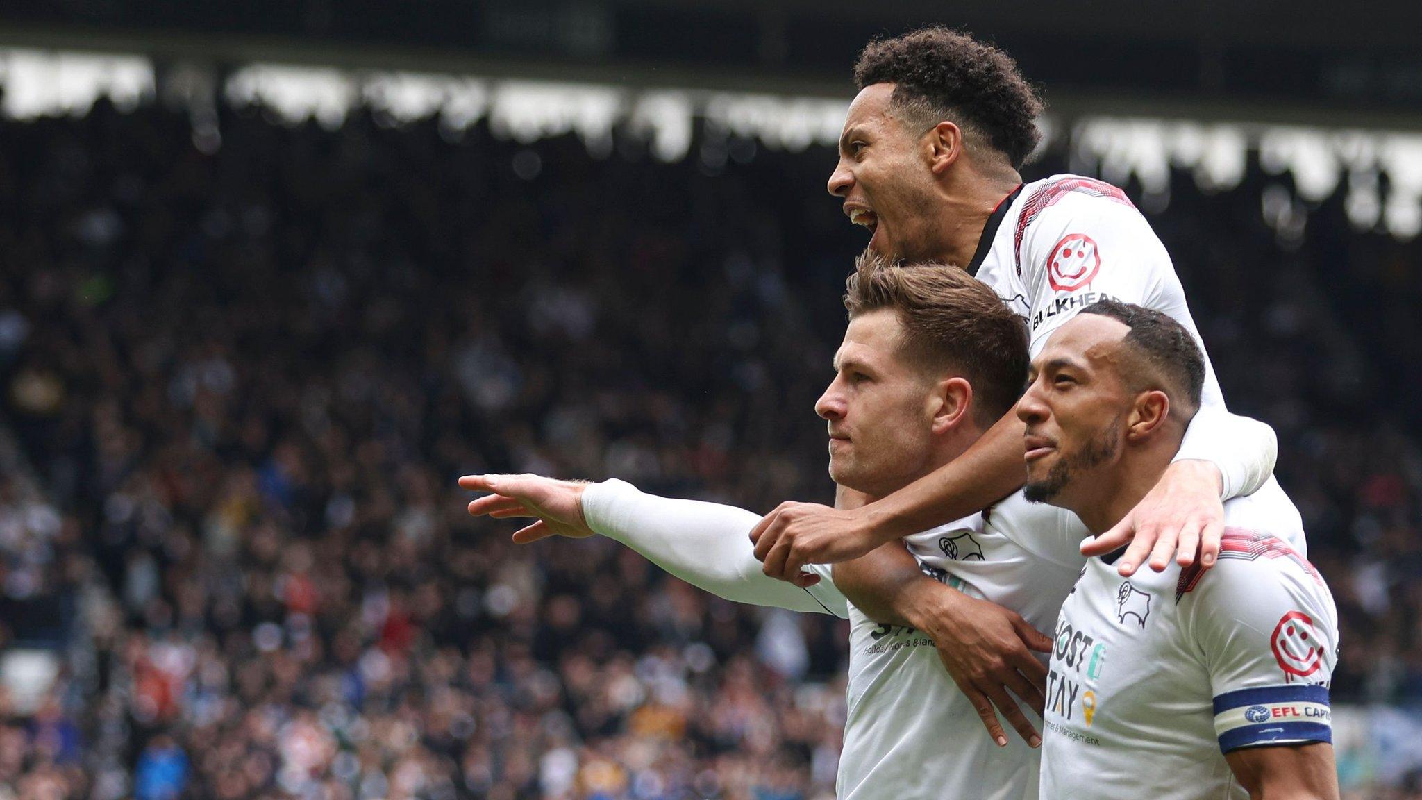 James Collins celebrates scoring Derby's second against Carlisle