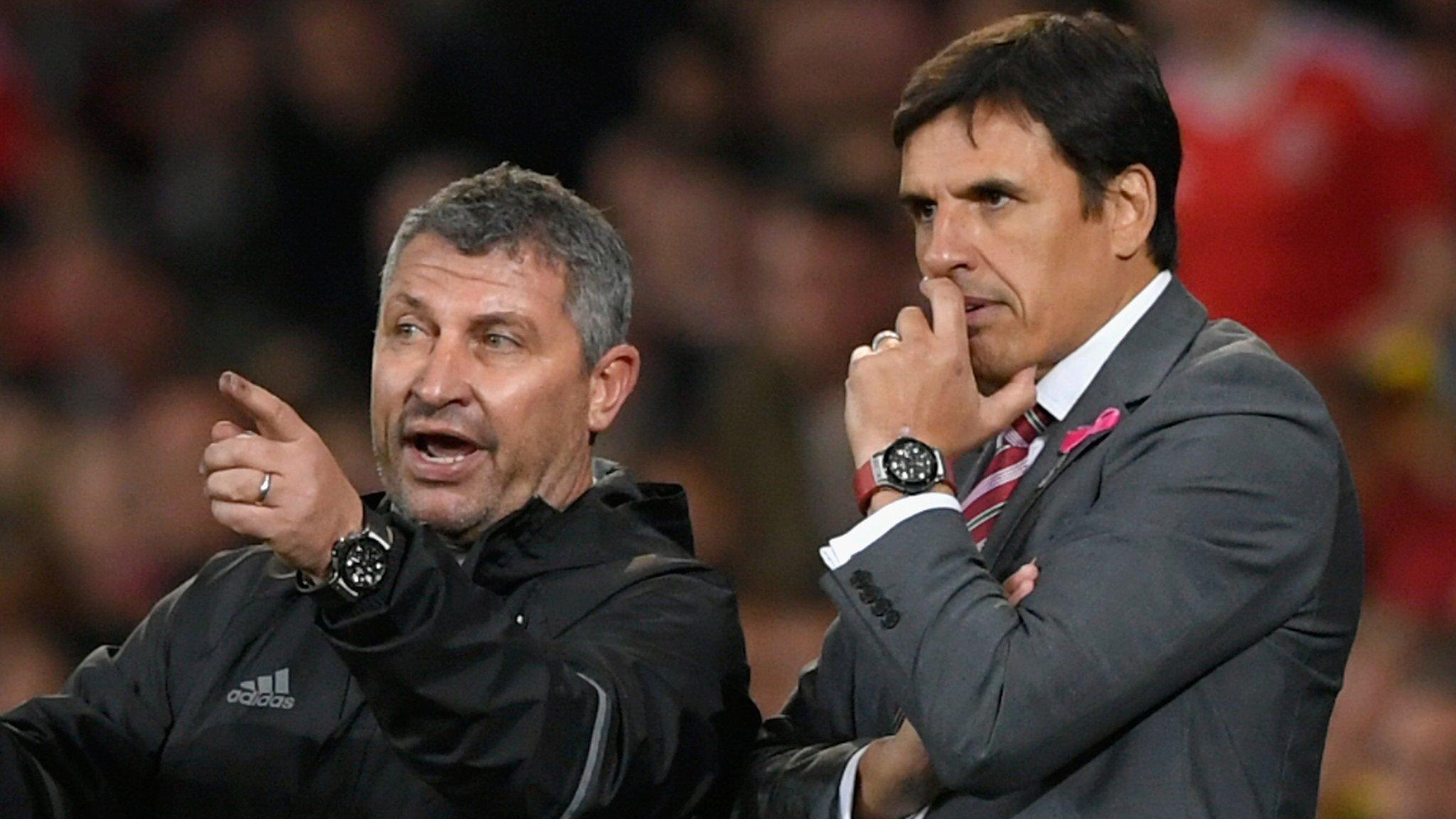 Osian Roberts and Chris Coleman look on during the World Cup Qualifier between Wales and the Republic of Ireland