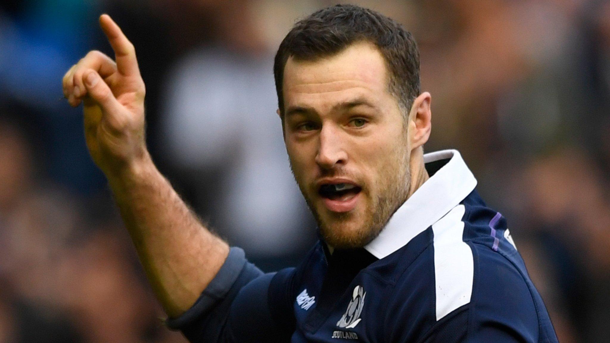 Scotland wing Tim Visser celebrates scoring a try against Wales