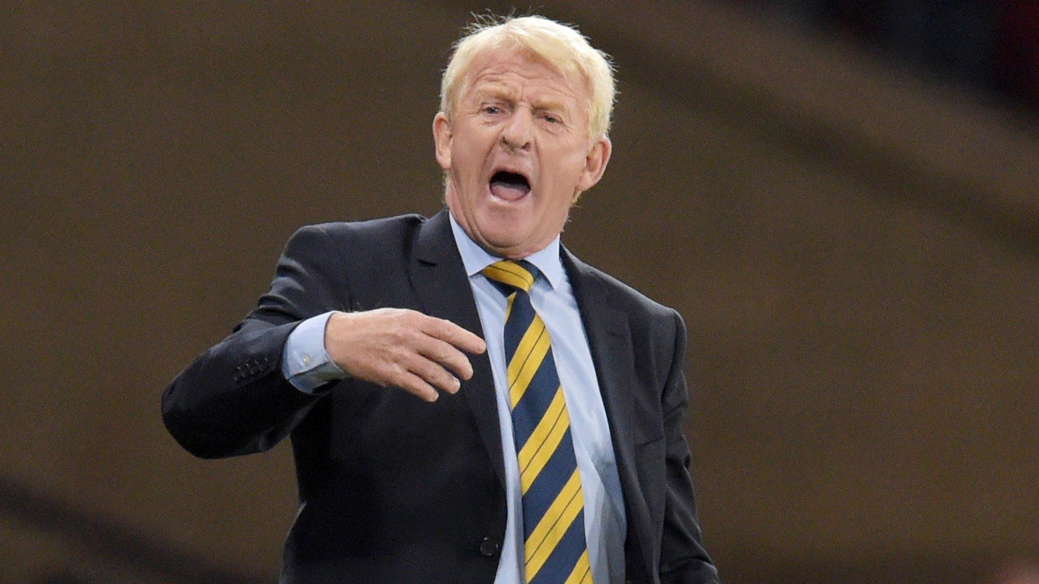 Scotland manager Gordon Strachan makes a point to his players against Lithuania