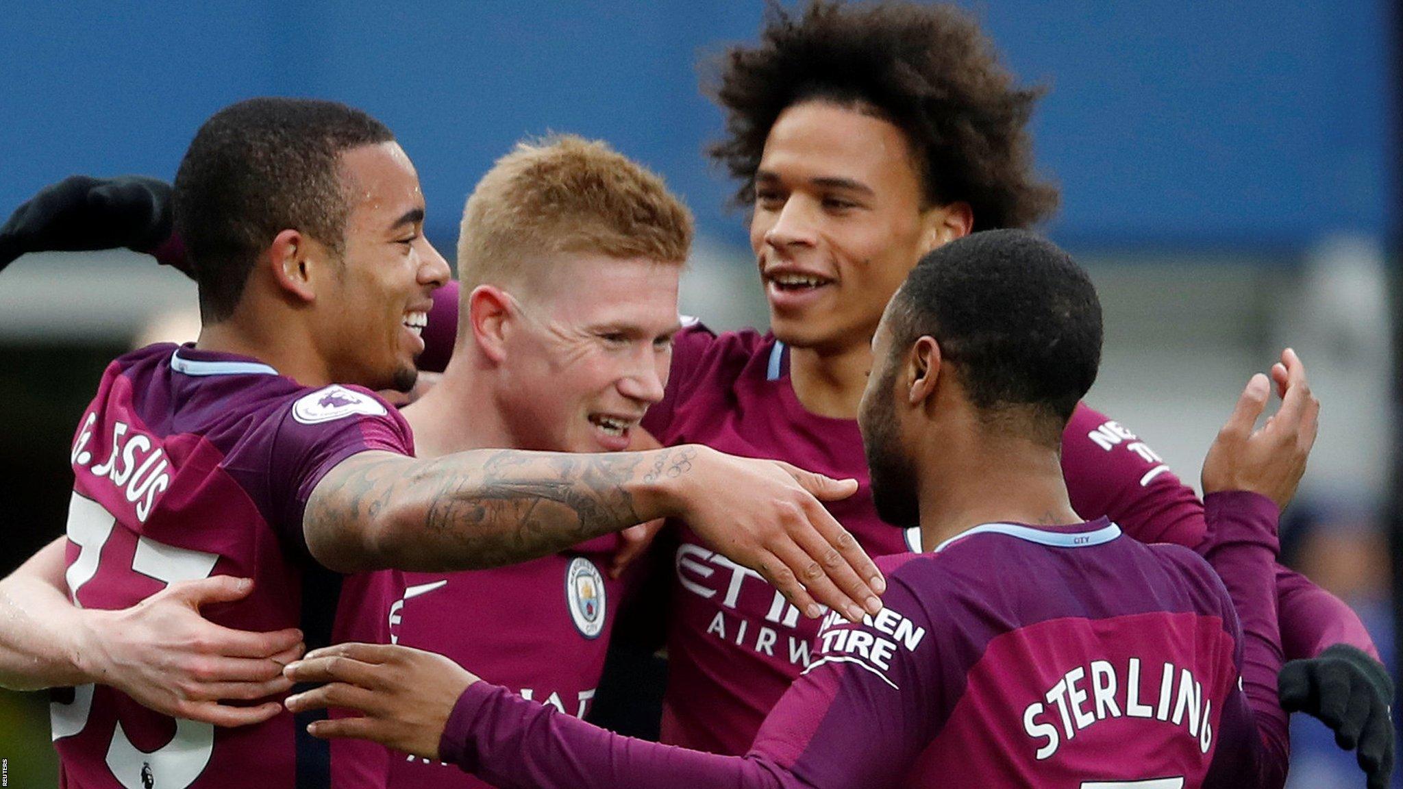 Man City players celebrate