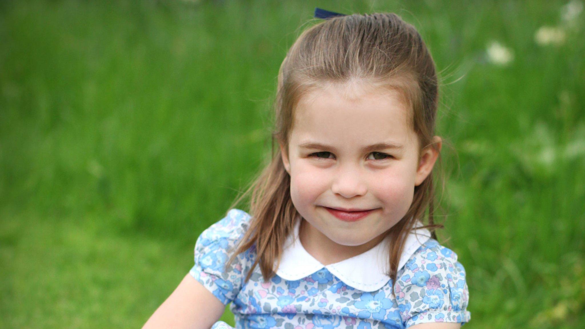 princess-charlotte-smiles-at-the-camera.