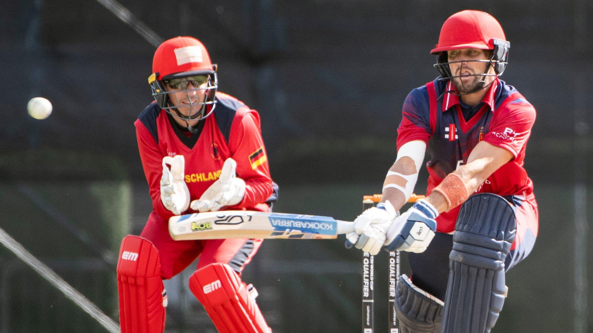 Jersey's Jonty Jenner plays a reverse sweep against Germany