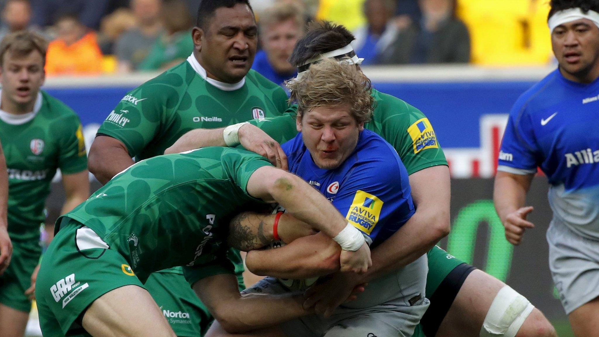 Jared Saunders of Saracens is tackled